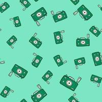 Photo camera seamless pattern. Cute vintage cameras background. vector