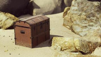 treasure chest in sand dunes on a beach video