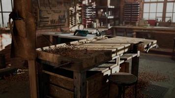 Retro stylized old tools on wooden table in a joinery video