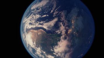 Earth planet viewed from space at night showing the lights of countries video