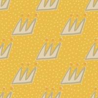 Bright seamless doodle pattern with grey contoured crowns. Yellow background with dots. vector