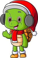 The cute turtle is wearing the santa hat and gesturing something vector
