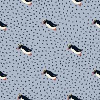 Decorative arctic animals seamless pattern with crested penguins shapes. Blue dotted background. Cartoon print. vector