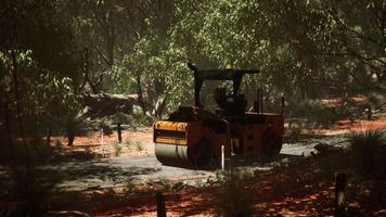road roller tractor in the forest video