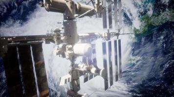 A view of the Earth and a spaceship. ISS is orbiting the Earth video