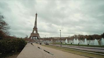 Eiffel Tower, Timelapse view from Trocadero square cloudy sky in winter day.