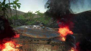 burned tank in the desert at sunset video