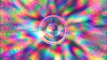 Abstract background with pink rings and multi-colored bokeh. video