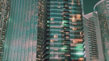 Aerial view of glowing high rise buildings big city photo