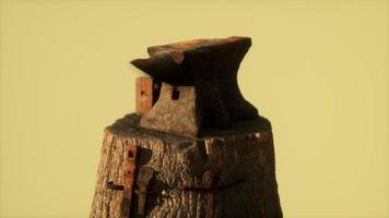 Old rusty anvil from the village forge photo