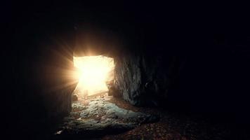 sun beams in stone cave photo