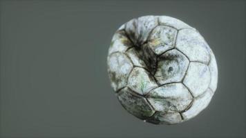 old deflated leather soccer ball photo