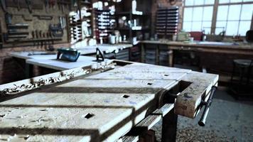 Retro stylized old tools on wooden table in a joinery photo