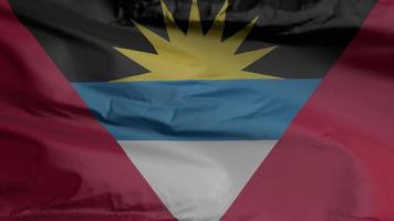 Antígua e Barbuda bandeira closeup sem costura acenando animação. fundo de antígua e barbuda. renderização 3D, resolução 4k