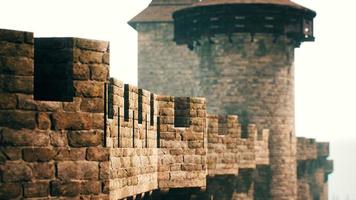 old castle walls at the sunset photo