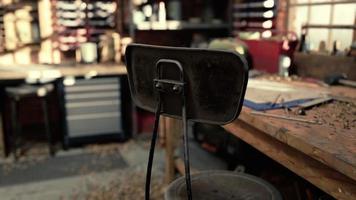 Retro stylized old tools on wooden table in a joinery photo