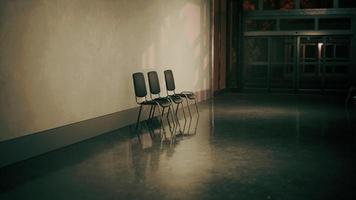 empty corridor in hospital with chairs photo