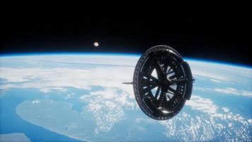 futuristic Space satellite orbiting the earth photo