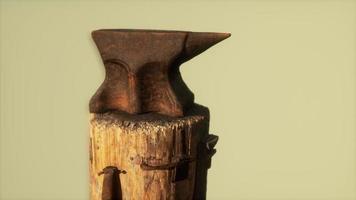 Old rusty anvil from the village forge photo