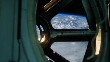 Cockpit view from International Space Station operating nearby of planet Earth photo