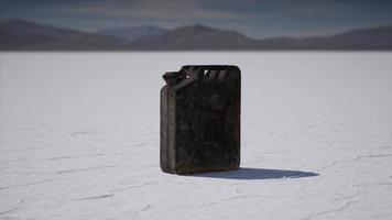 old metal fuel canister at salt flats in Utah photo