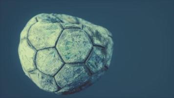 old deflated leather soccer ball photo