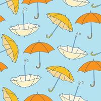 Seamless pattern with yellow umbrellas on blue background vector