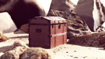 treasure chest in sand dunes on a beach photo