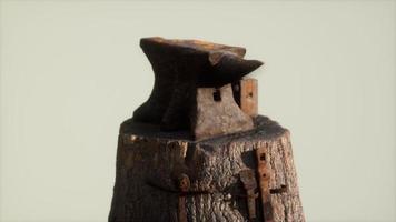 Old rusty anvil from the village forge photo