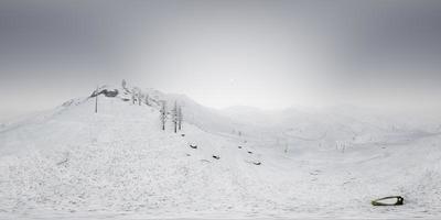 vr 360 camera above the snow rocky mountains ridges in a cold polar region photo