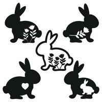 A set of silhouettes of Easter bunnies with a pattern, isolated vector illustration