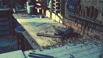 Various carpenter tools and supplies in a garage photo