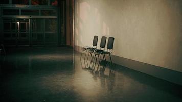 empty corridor in hospital with chairs photo