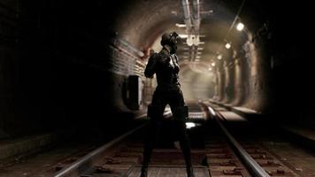 Post-apocalyptic woman in subway tonnel photo