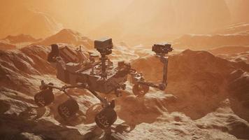 Curiosity Mars Rover exploring the surface of red planet. Elements of this image furnished by NASA photo