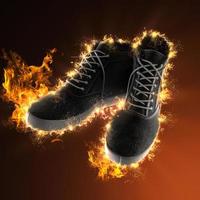 vintage black shoes in fire photo