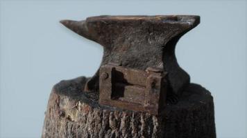 Old rusty anvil from the village forge photo