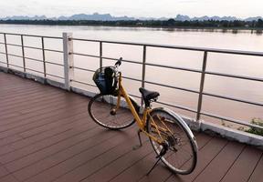 Bicycle on the bile lane nest to mekong river in the morning photo