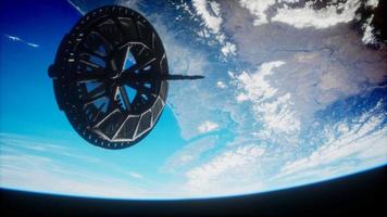 futuristic Space satellite orbiting the earth photo