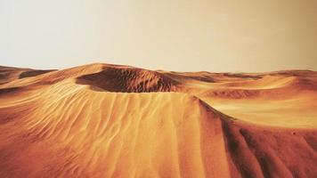 puesta de sol sobre las dunas de arena en el desierto. valle de la muerte, estados unidos foto