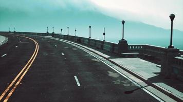 empty bridge fragment near the mountains photo