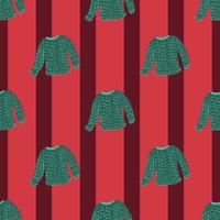 Hand drawn green cozy sweater seamless doodle pattern. Red striped background. vector