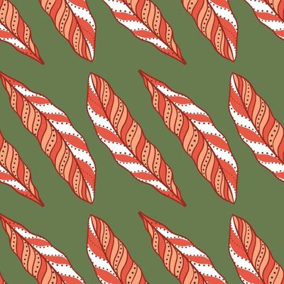 Red ornamental feather elements seamless pattern in ethnic style. Green background. Natural simple ornament.