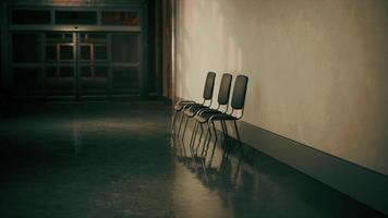 empty corridor in hospital with chairs photo