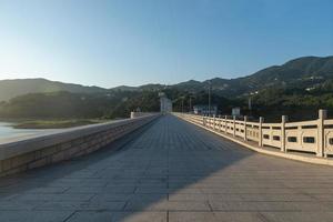 Under the sun, a stone road leads to the distance photo