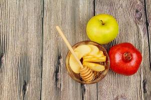 Apples, pomegranate and honey Rosh Hashanah photo