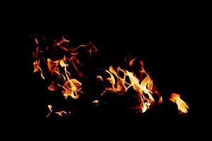 Fire flame texture. Burning material backdrop. Burn effect pattern. Blaze and torch wallpaper. Heat and haze backdrop. photo