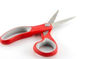 red scissors isolate on white background photo