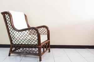 wicker chair in the morning light at home photo