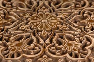 Oriental and Asian traditional element of decorative woodcarving closeup photo